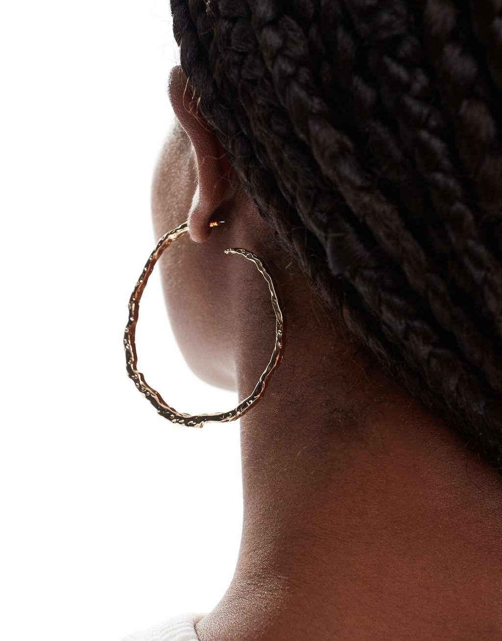 ASOS DESIGN hoop earrings with textured molten detail in gold tone Product Image