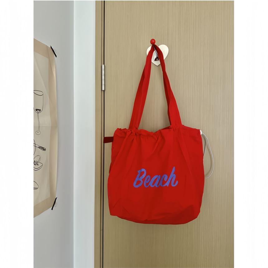 Lettering Drawstring Tote Bag Product Image