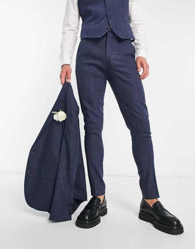 ASOS DESIGN wedding skinny wool mix suit pants in navy herringbone Product Image