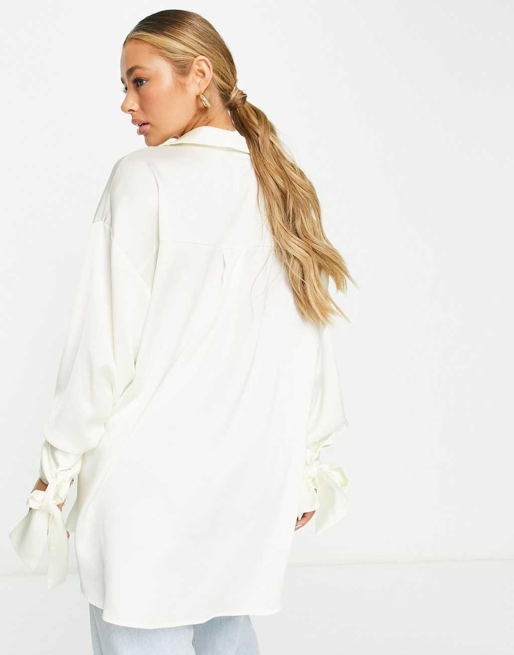 ASOS DESIGN oversized satin shirt with tie cuff detail in cream Product Image