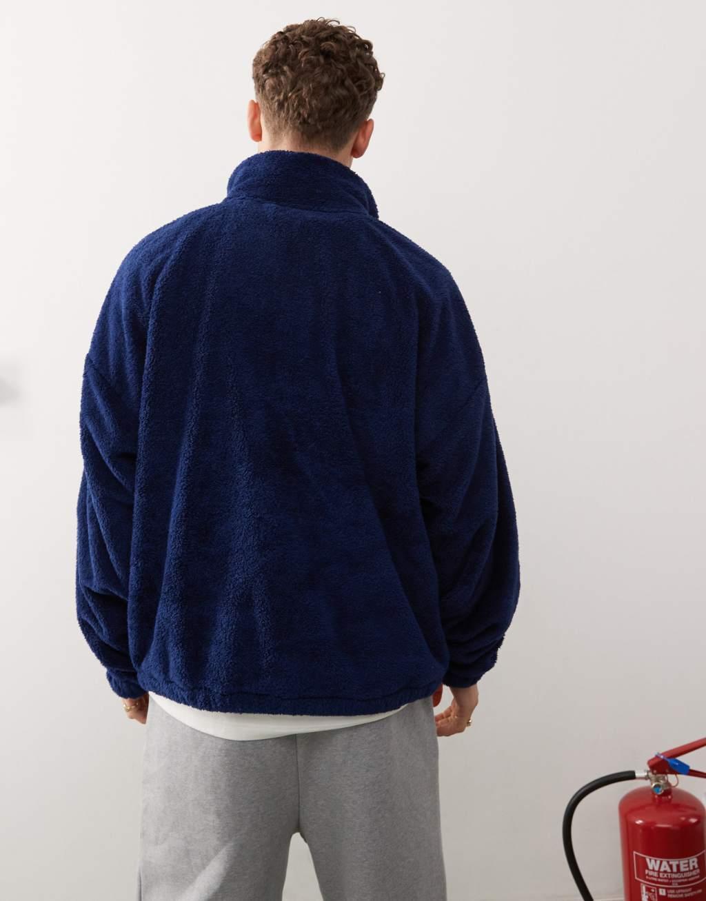 COLLUSION emb borg funnel sweater in navy Product Image