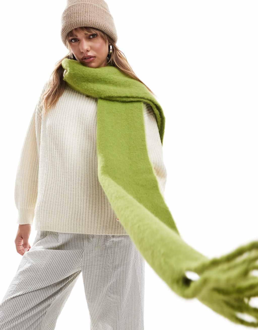 ASOS DESIGN fluffy tassel scarf in green Product Image