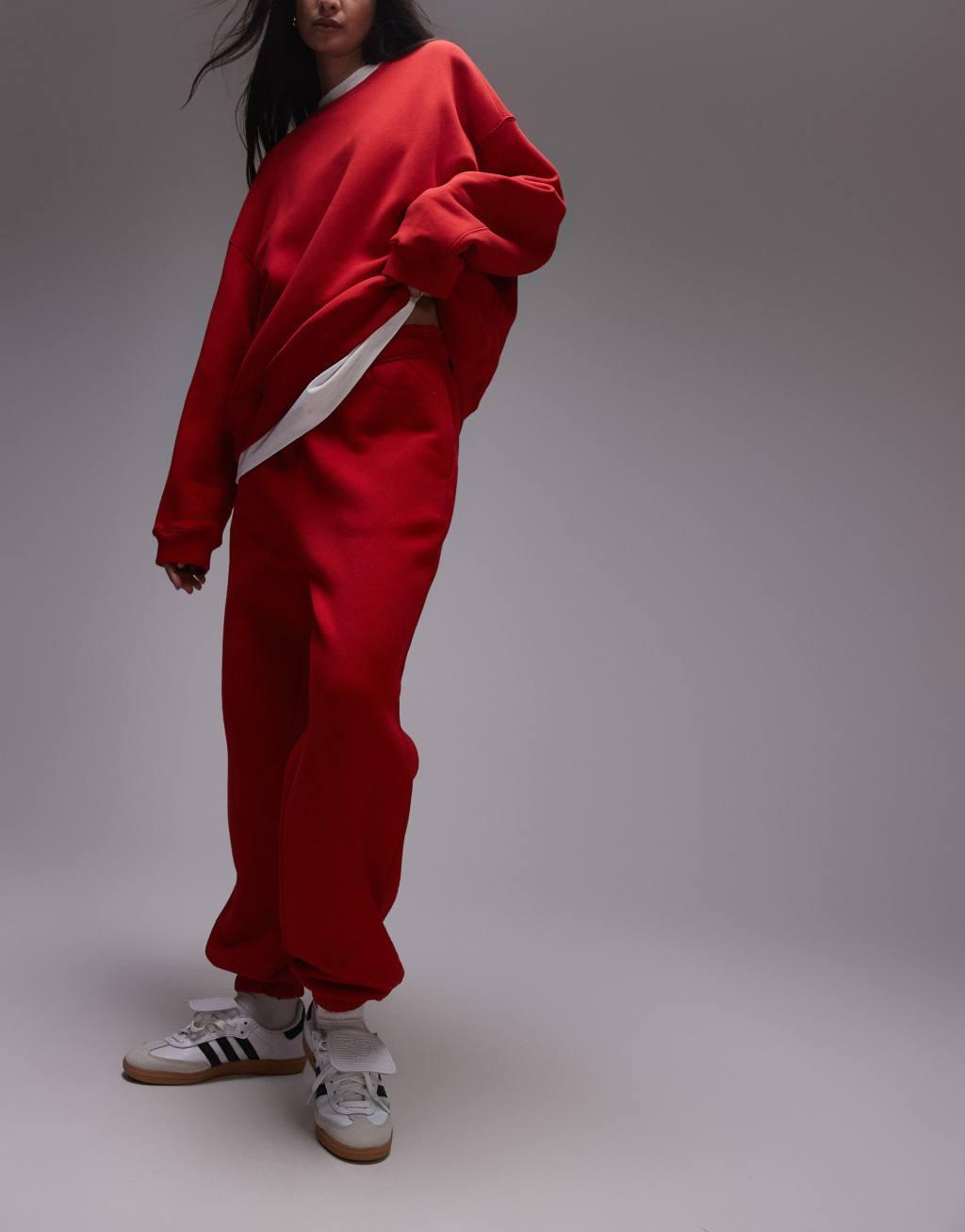 Topshop cuffed sweatpants in red Product Image