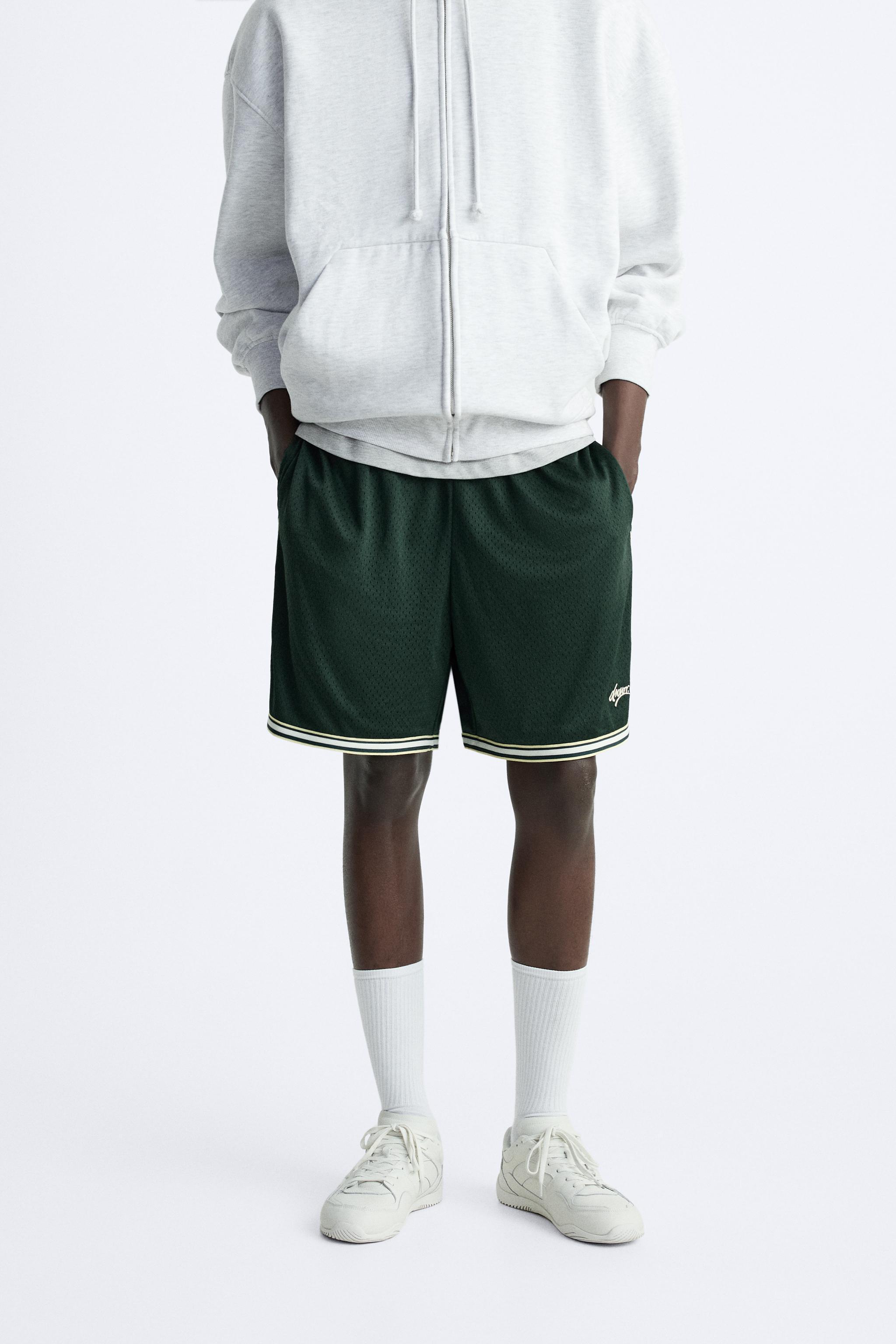 SHORTS WITH CONTRASTING STRIPE Product Image