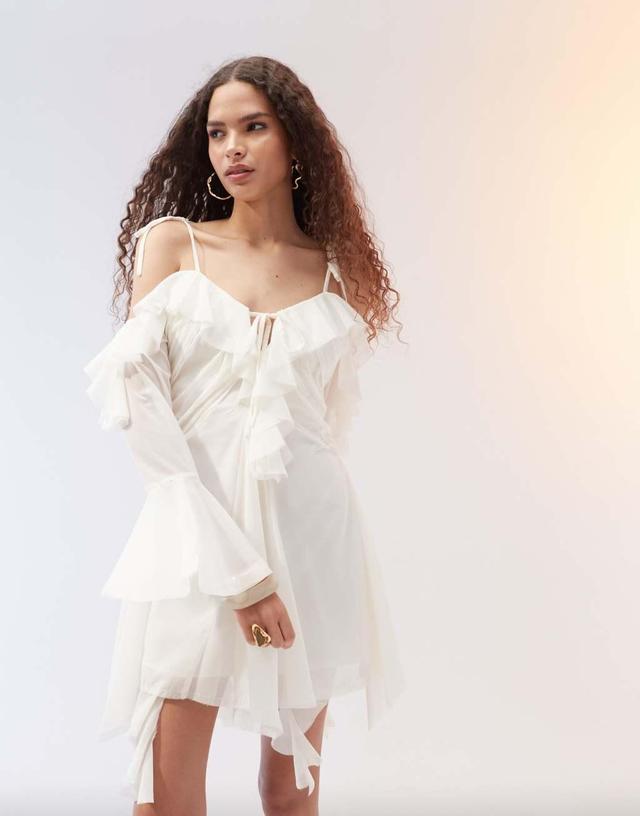 ASOS DESIGN ragged edge mini dress with godets and under layer frills in ivory Product Image