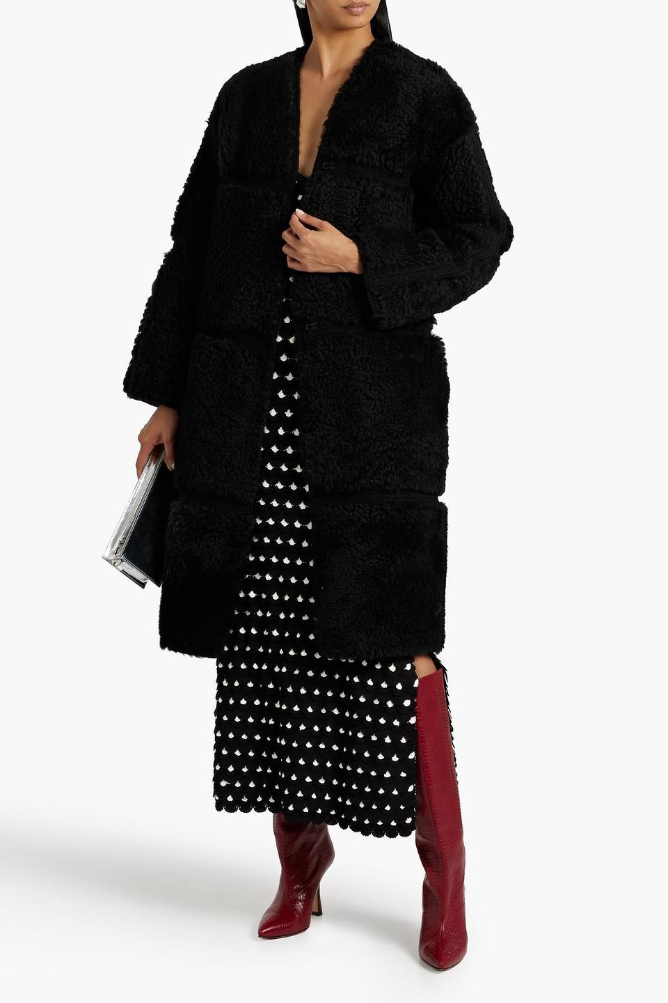 Knit-trimmed Shearling Coat In Black Product Image