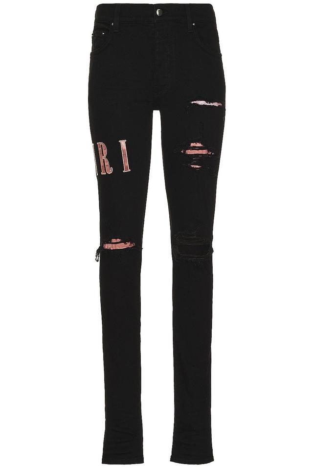 Amiri Tie Dye Core Logo Jean in Black OD - Black. Size 33 (also in 34). Product Image