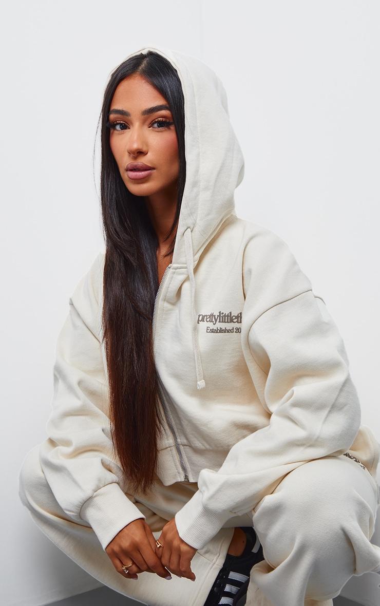 PRETTYLITTLETHING Petite Cream Premium Print Zip Front Hoodie Product Image