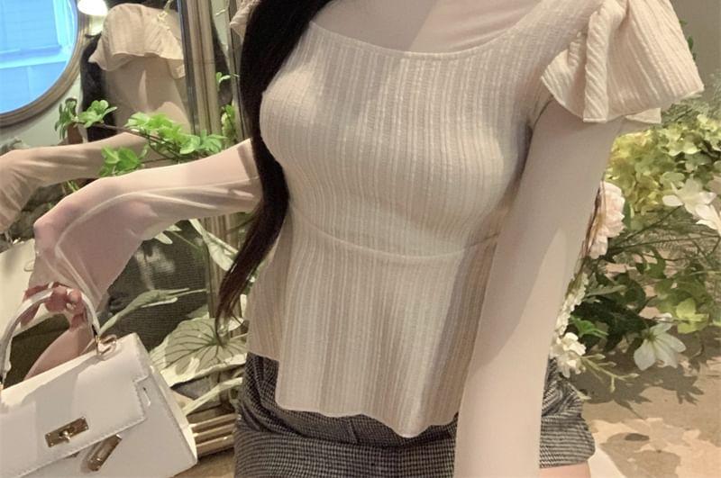 Mock Two-Piece Long-Sleeve Turtleneck Plain Peplum Mesh Panel Ribbed Knit Top Product Image