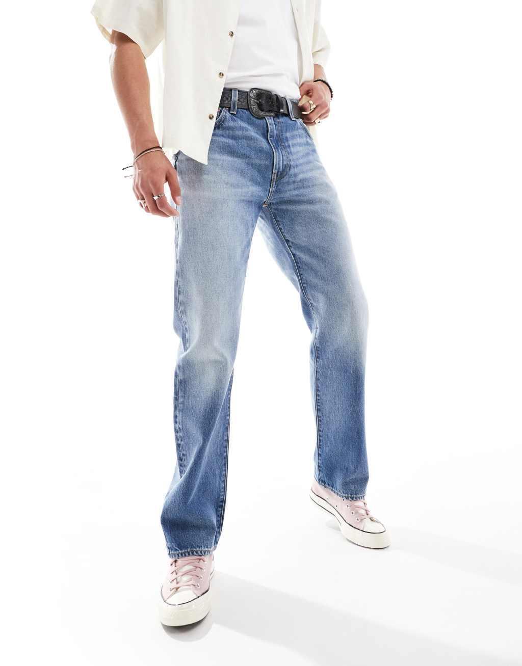 Levi's 555 '{1} relaxed straight fit jeans in mid blue product image