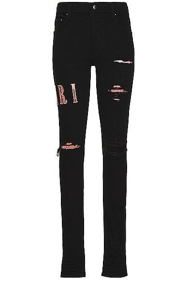 Amiri Tie Dye Core Logo Jean in Black OD - Black. Size 33 (also in 34). Product Image