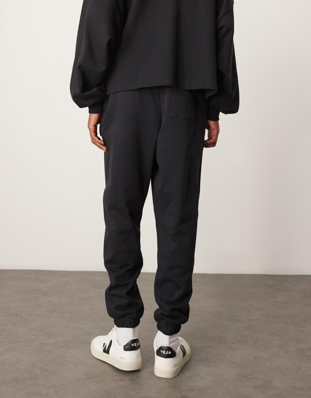 ASOS DESIGN essential oversized sweatpants in black Product Image