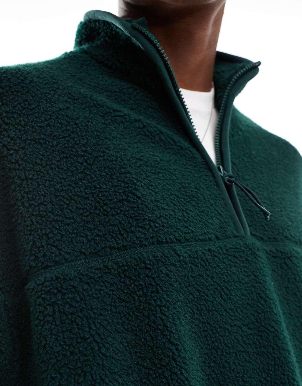 ASOS DESIGN oversized borg half zip sweatshirt in dark green Product Image