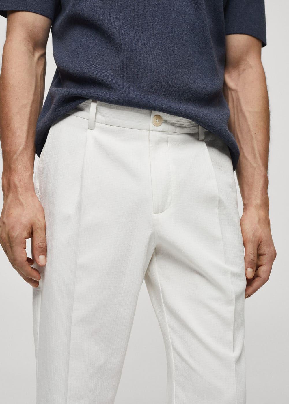 MANGO MAN - Slim fit trousers with pleated texture off whiteMen Product Image