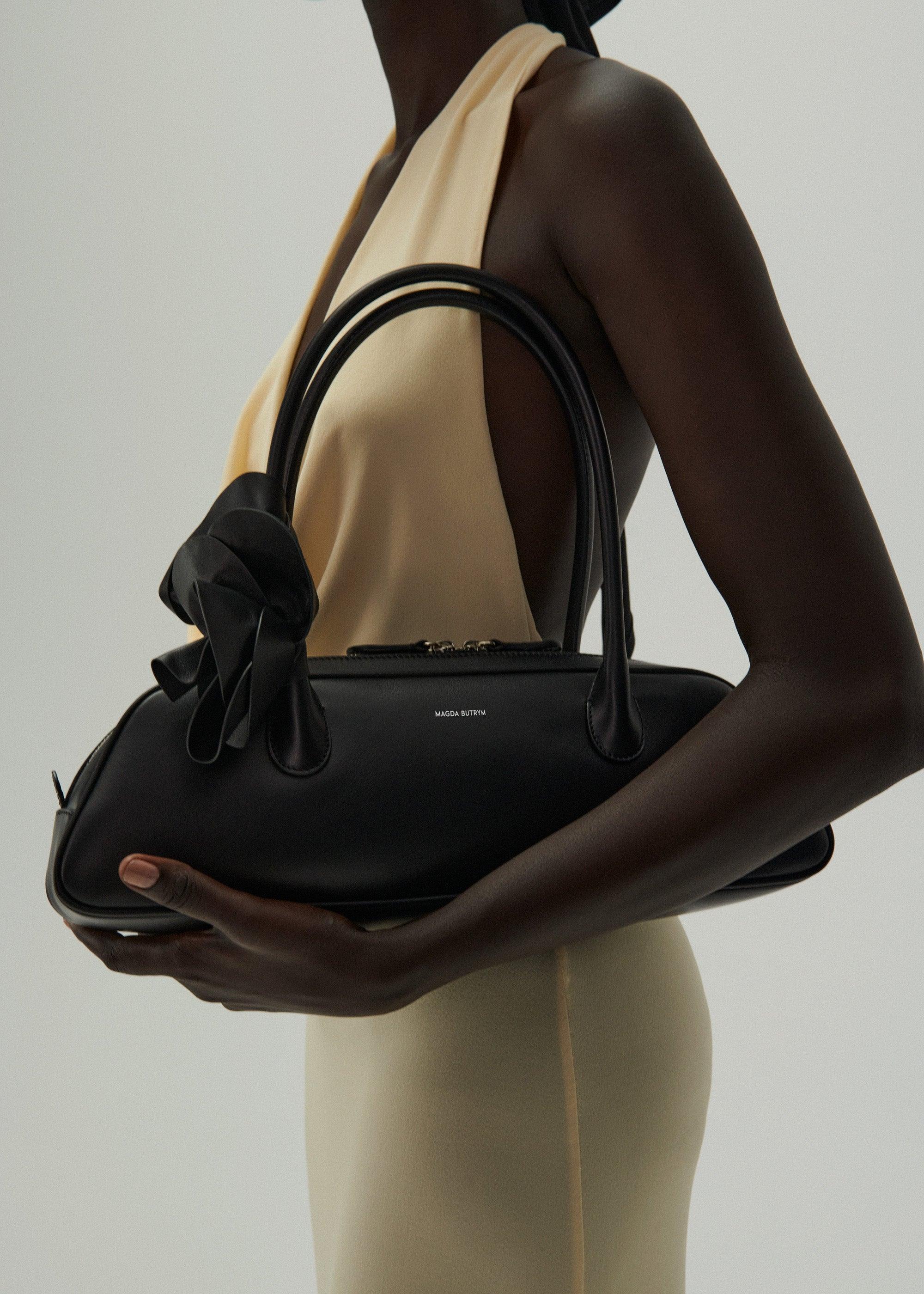 Brigitte trapeze bag in black leather and silver Product Image