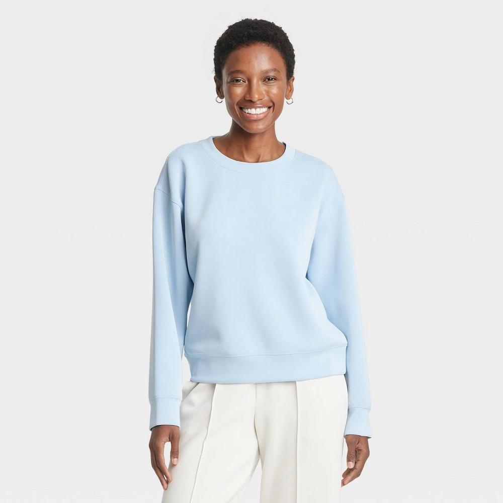 Womens Sandwash Pullover Sweatshirt - A New Day Light Blue XS Product Image