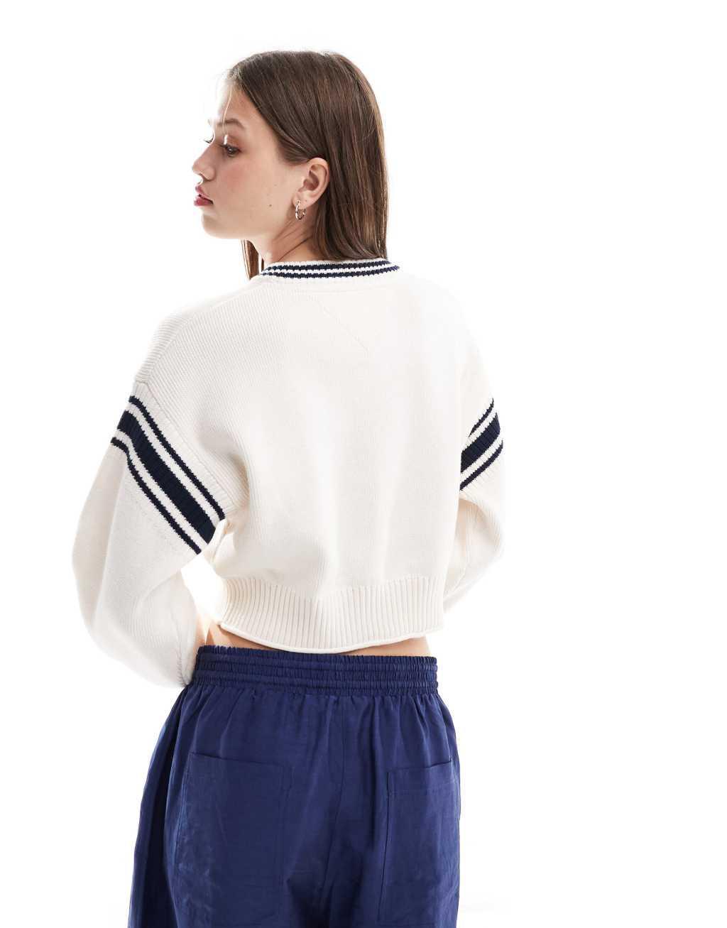 Tommy Jeans crop varsity v neck sweater in white Product Image