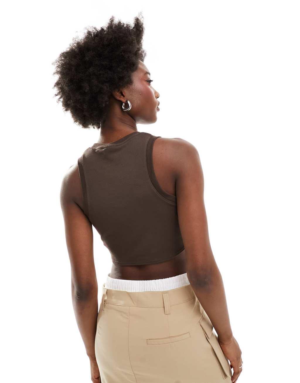 Nike Essential ribbed cropped tank top in brown Product Image