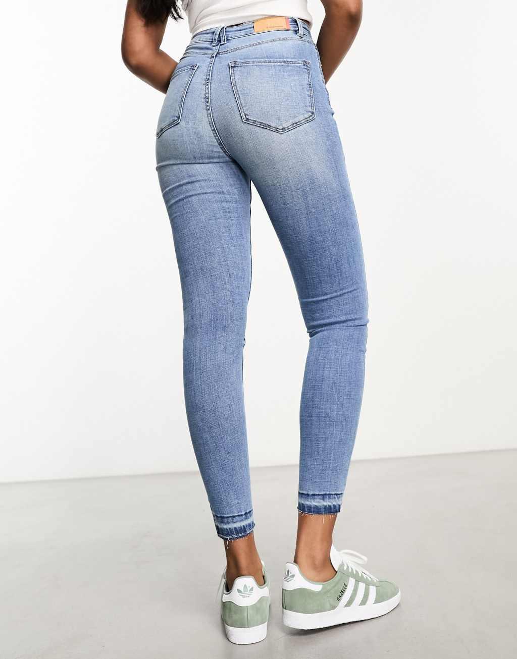 Stradivarius super high waist skinny jeans in medium blue Product Image