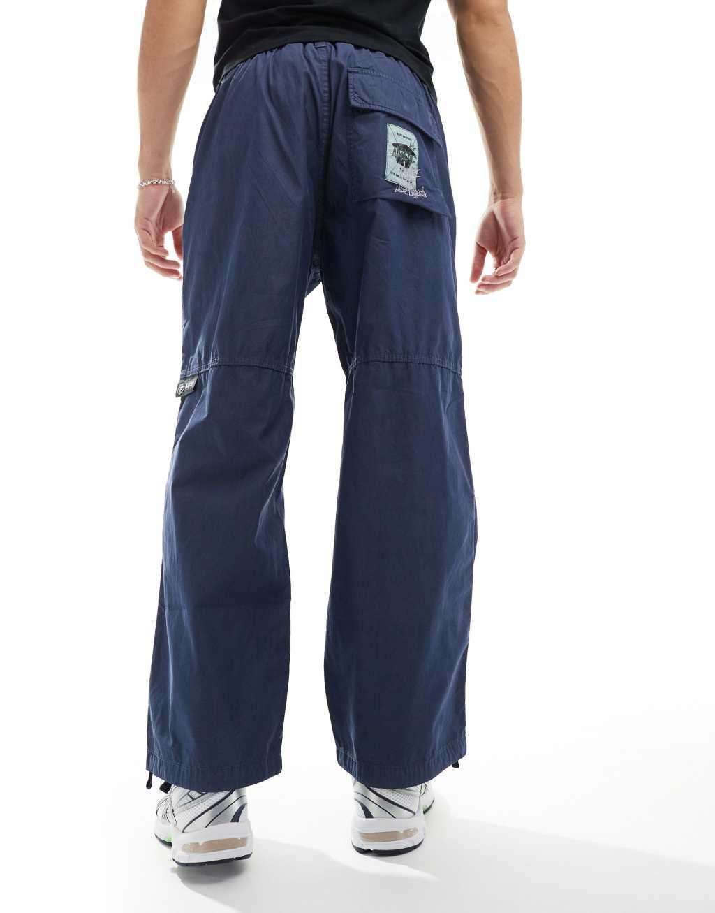 AAPE By A Bathing Ape Carpenter pants in off blue Product Image