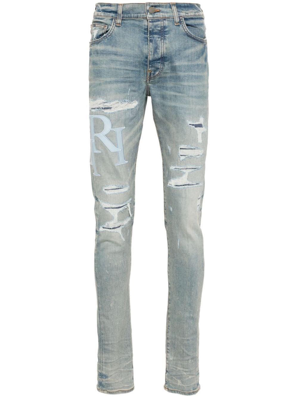 AMIRI Staggered-logo Skinny Jeans In Blue Product Image