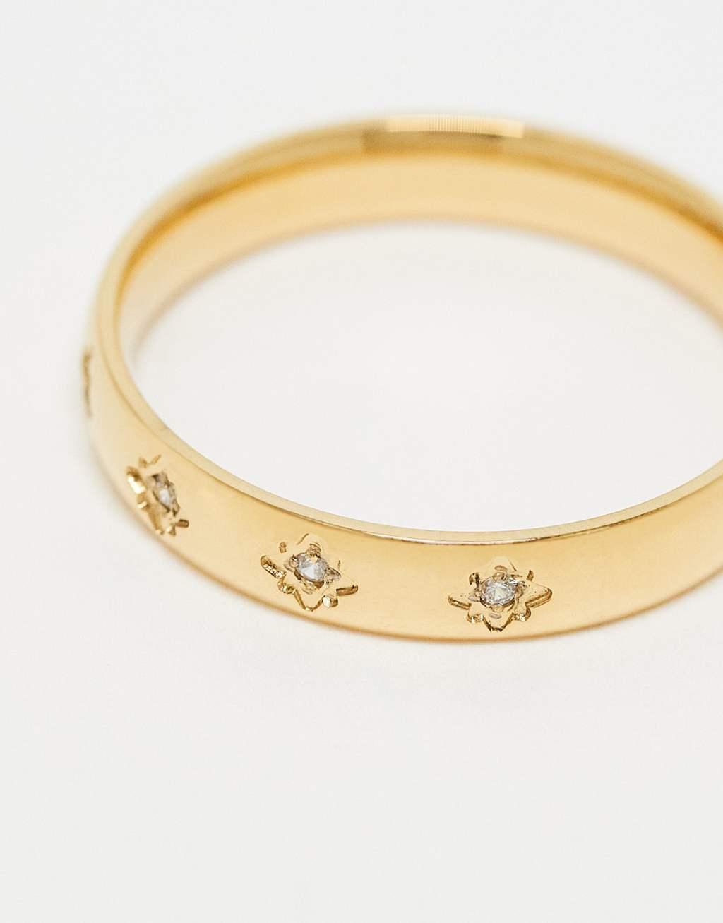 ASOS DESIGN Curve stainless steel ring with star crystal detail in gold tone Product Image