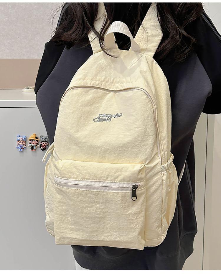 Lettering Multi-Pocket Backpack Product Image