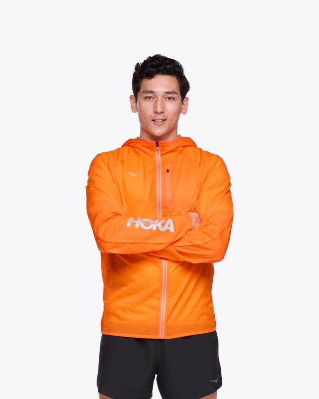 HOKA Mens Skyflow Jacket Viz in Electric Tangerine, Size XS Product Image