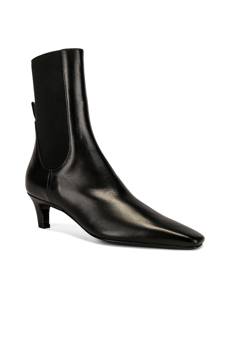 Toteme The Mid Heel Boot in Black - Black. Size 37 (also in 35). Product Image