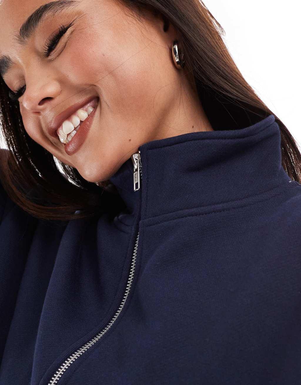 ASOS DESIGN high neck zip up sweatshirt in navy Product Image