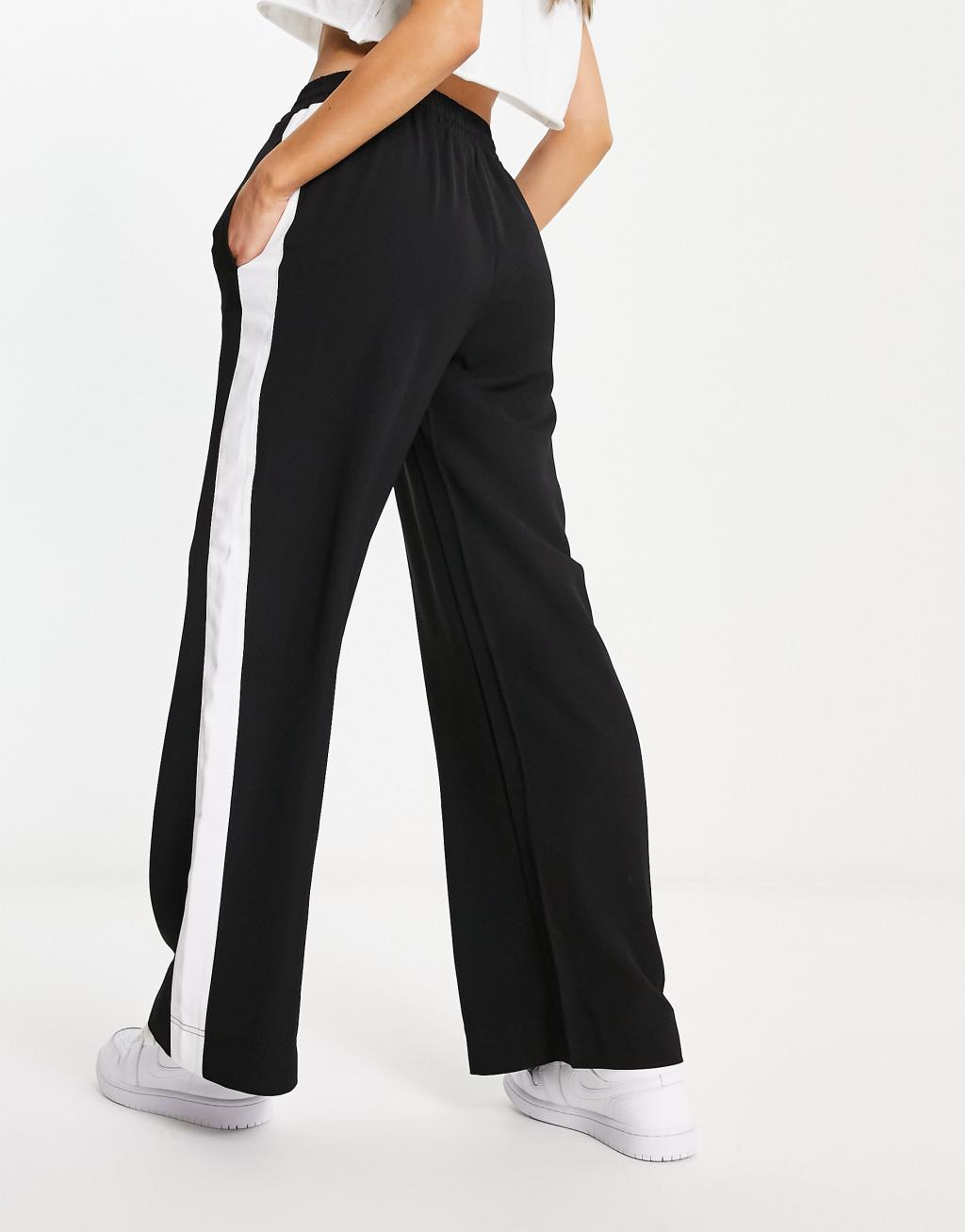 ASOS DESIGN pull on pants with contrast panel in black Product Image