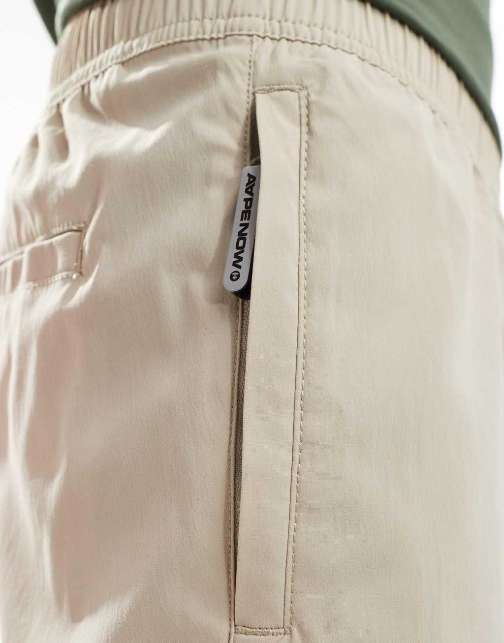 Aape By A Bathing Ape nylon shorts in beige Product Image