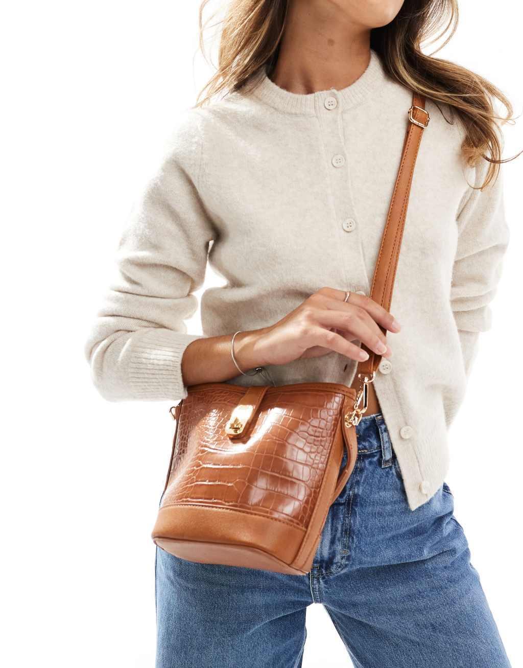 ASOS DESIGN top handle lock crossbody bag in brown Product Image