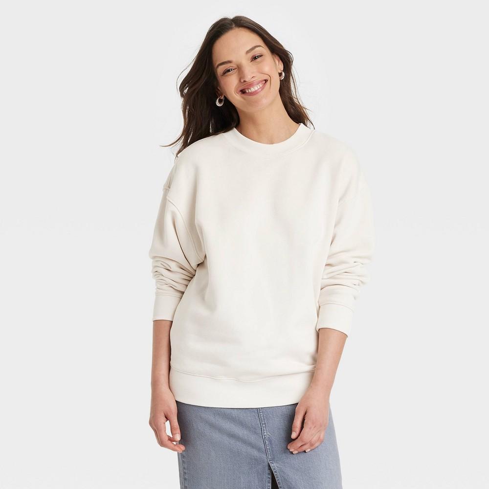 Womens Leisure Studio Oversized Pullover Sweatshirt - Universal Thread Cream Product Image