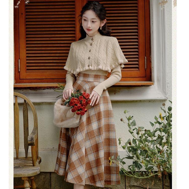 Set: Long-Sleeve Plain Knit Top + Stand Collar Button-Up Capelet + High Rise Plaid Midi A-Line Skirt Product Image