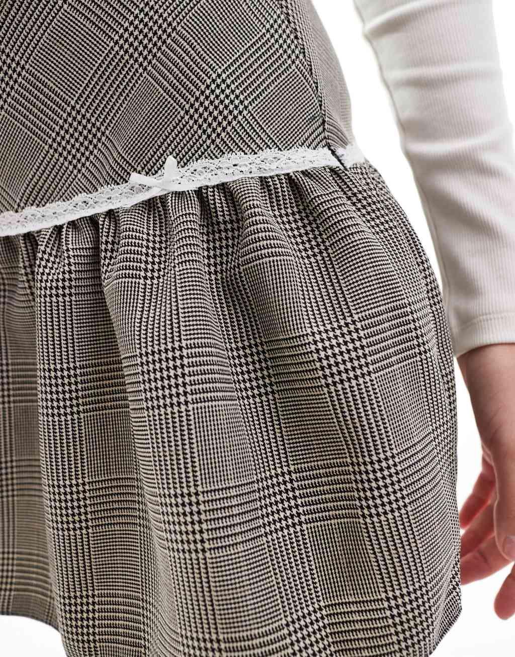 Miss Selfridge tailored ruffle hem bow detail mini skirt in mono plaid Product Image