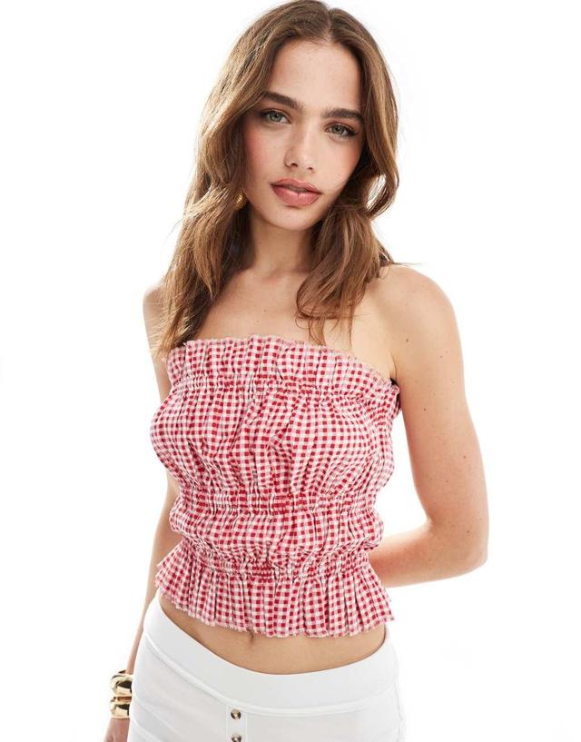 ASOS DESIGN shirred bandeau with raw edge in red gingham Product Image