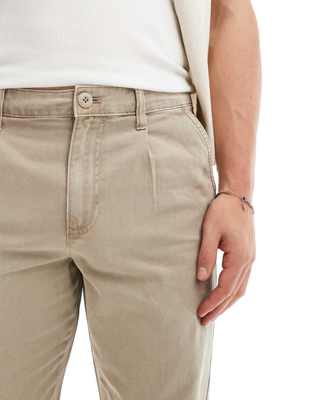 ASOS DESIGN baggy chino pants in washed beige  Product Image