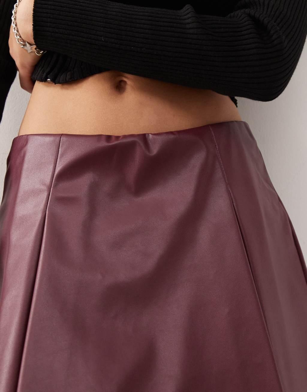 Reclaimed Vintage PU skort in burgundy Product Image