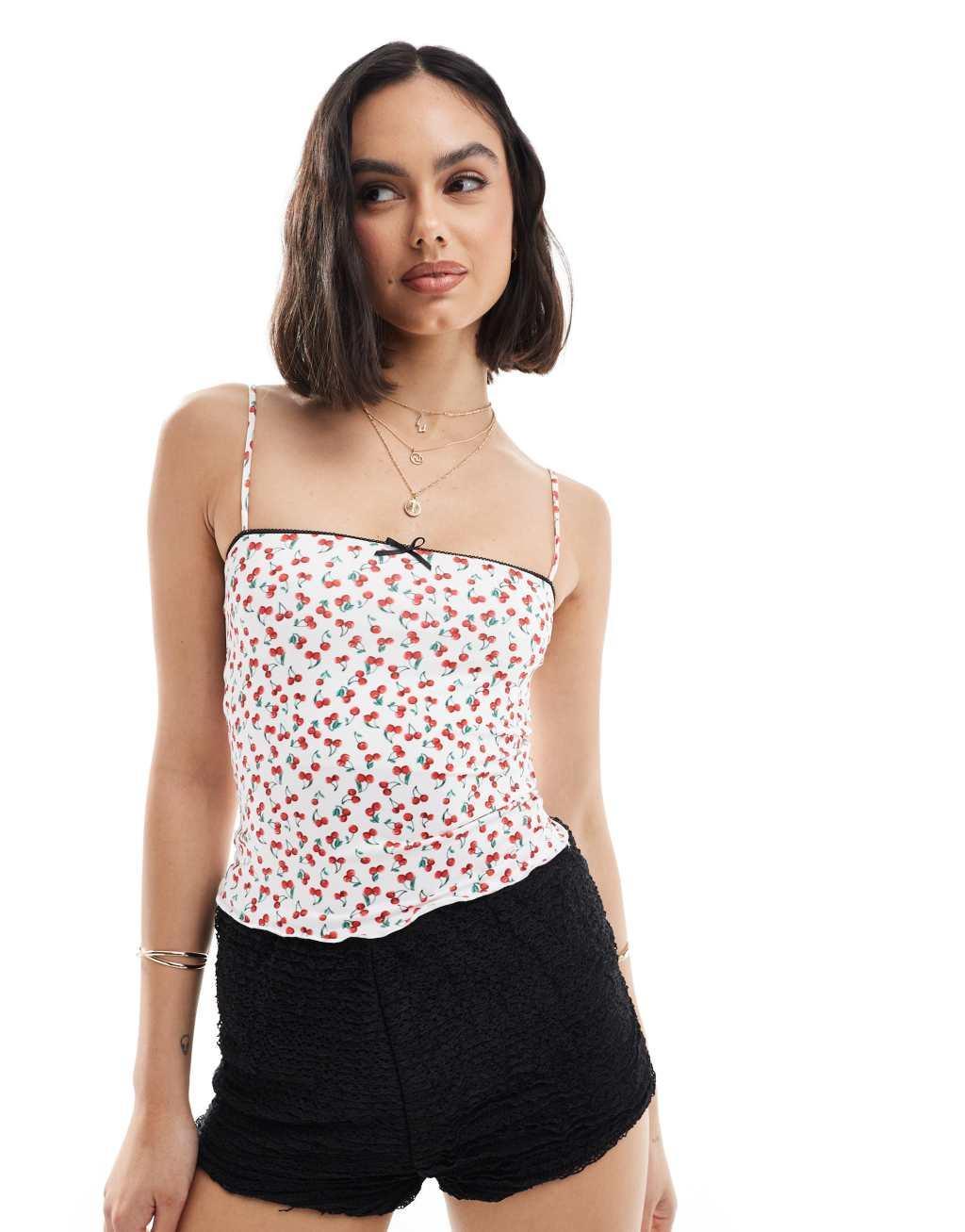 Bershka strappy straight neck cami top in cherry print Product Image