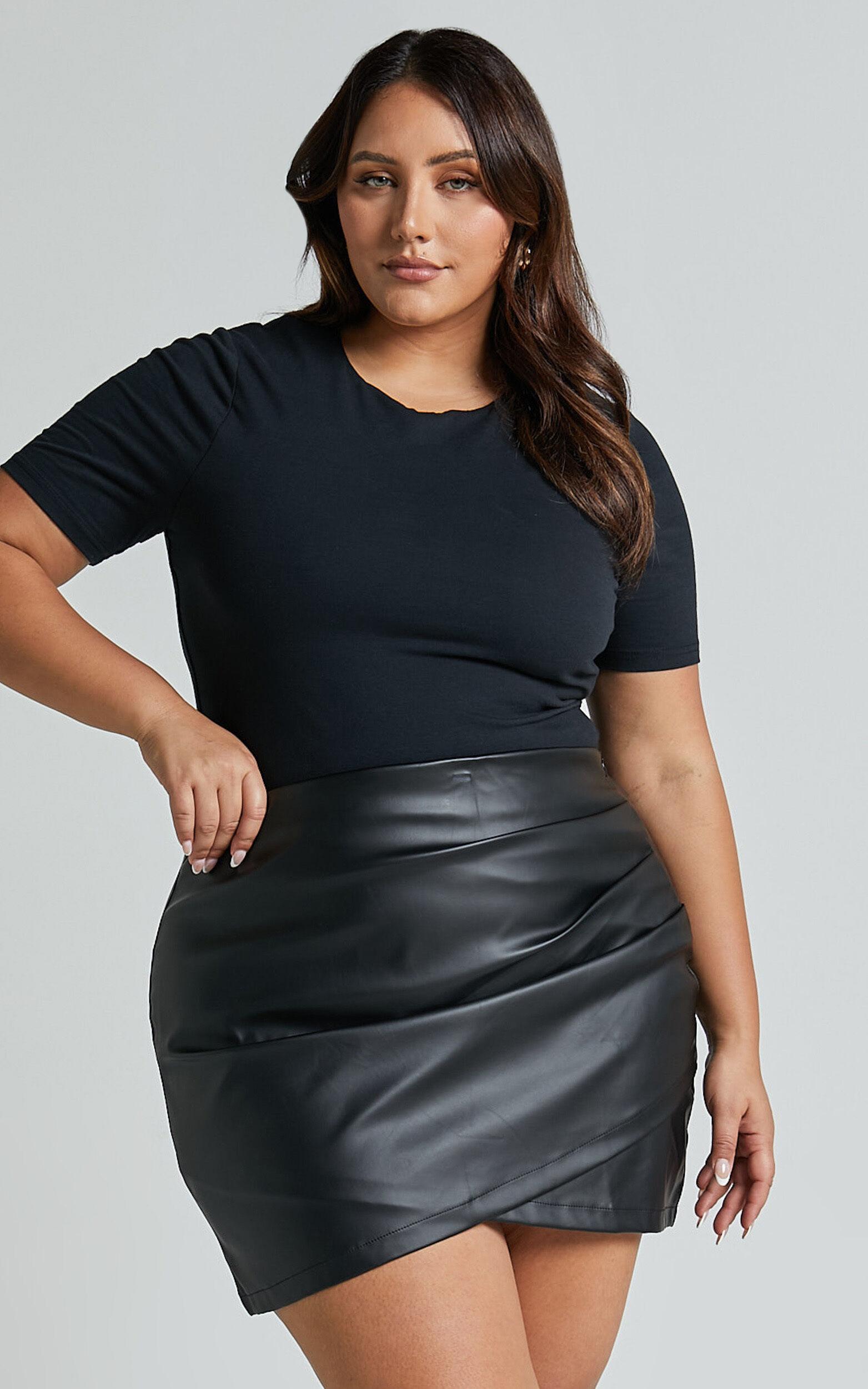 Ashlyn Mini Skirt - Faux Leather Overlap Skirt in Black Product Image