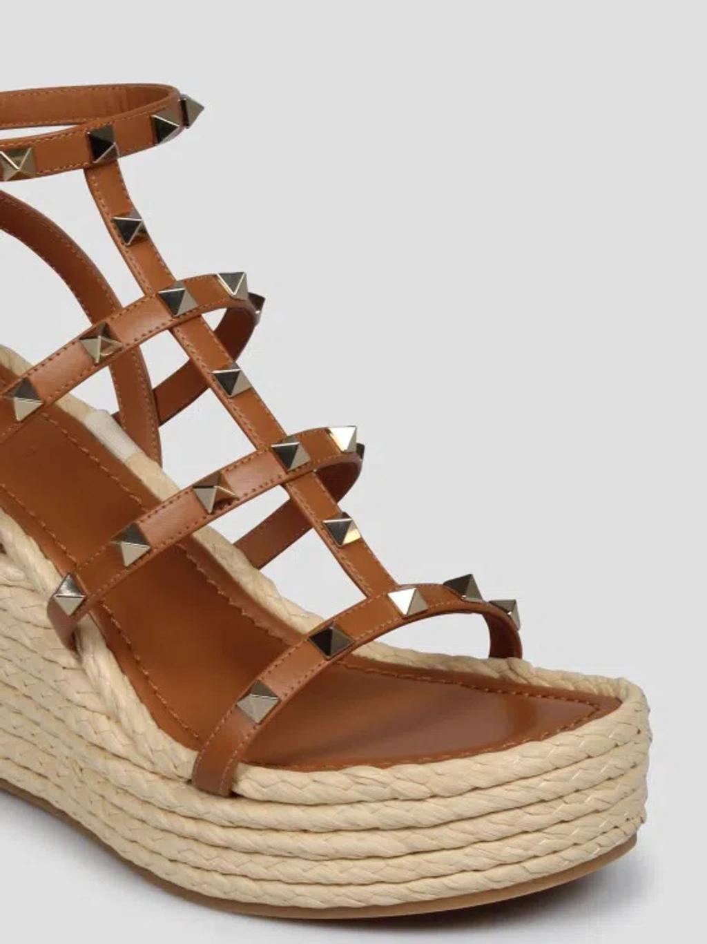 Valentino Rockstud Caged 95 Leather Wedge Sandal In Brown Product Image