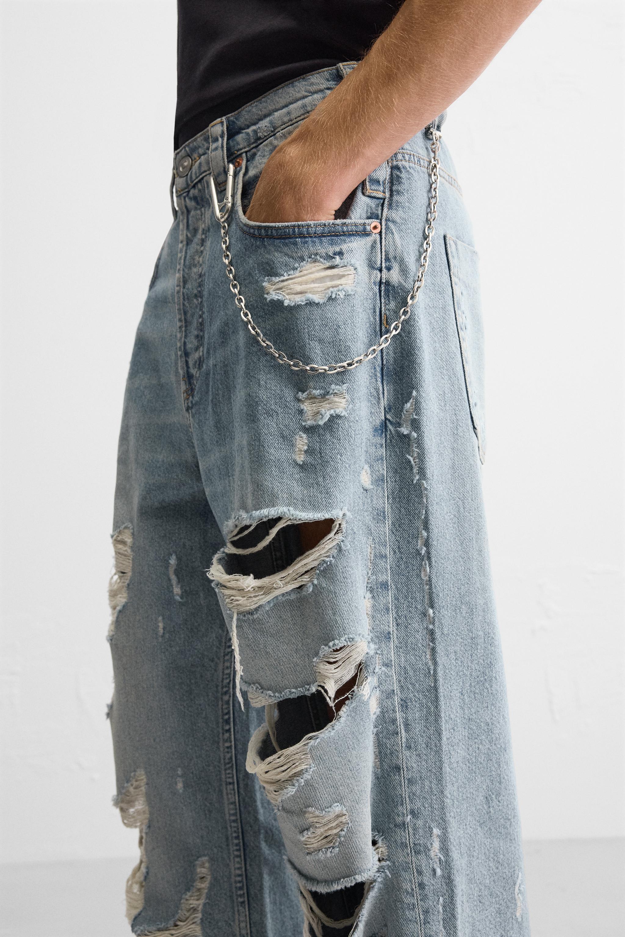 RIPPED EXTREME WASHED JEANS Product Image