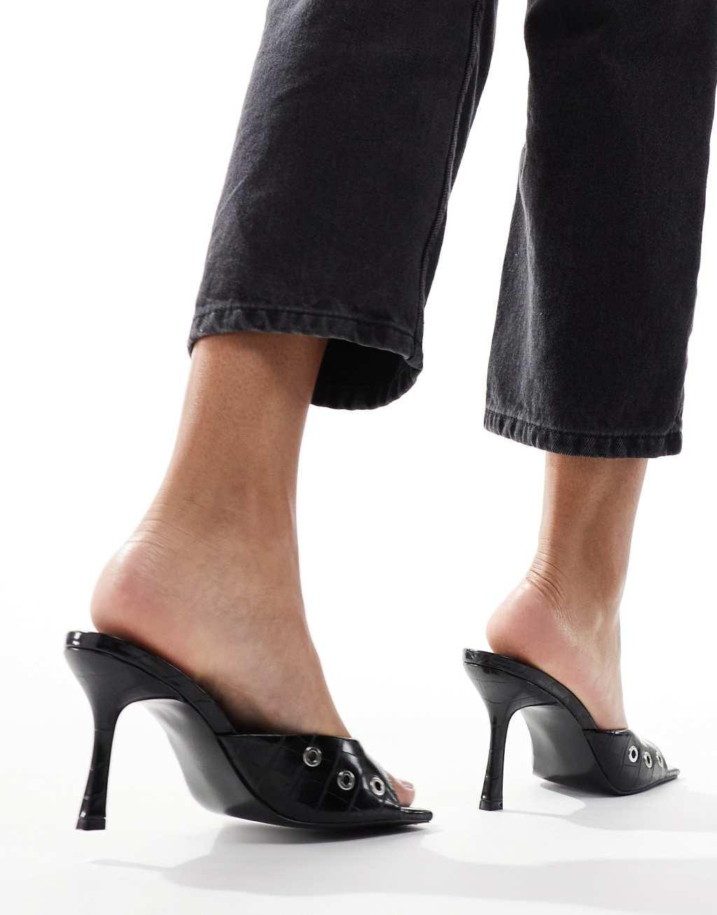 ASOS DESIGN Hammer eyelet detail mid heeled mules in black Product Image