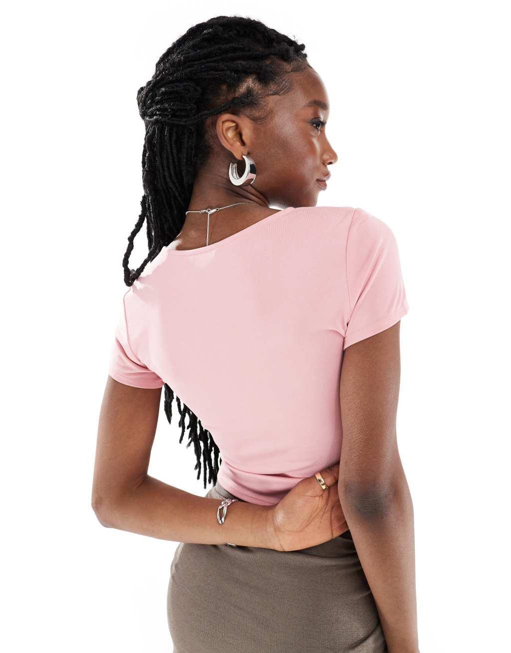 Monki super soft cropped short sleeve top with wrap front detail in pink Product Image