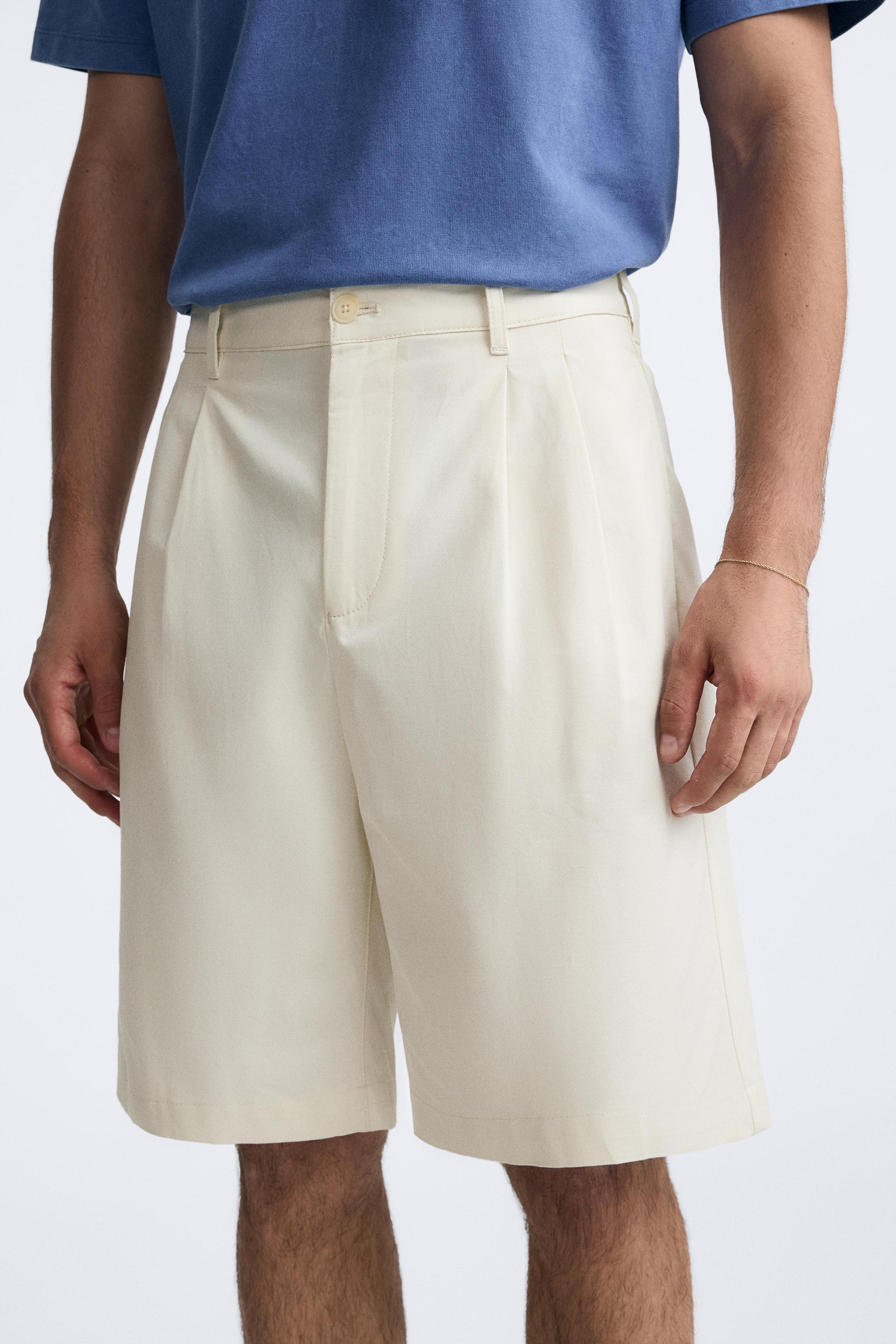 PLEATED WIDE FIT SHORTS Product Image