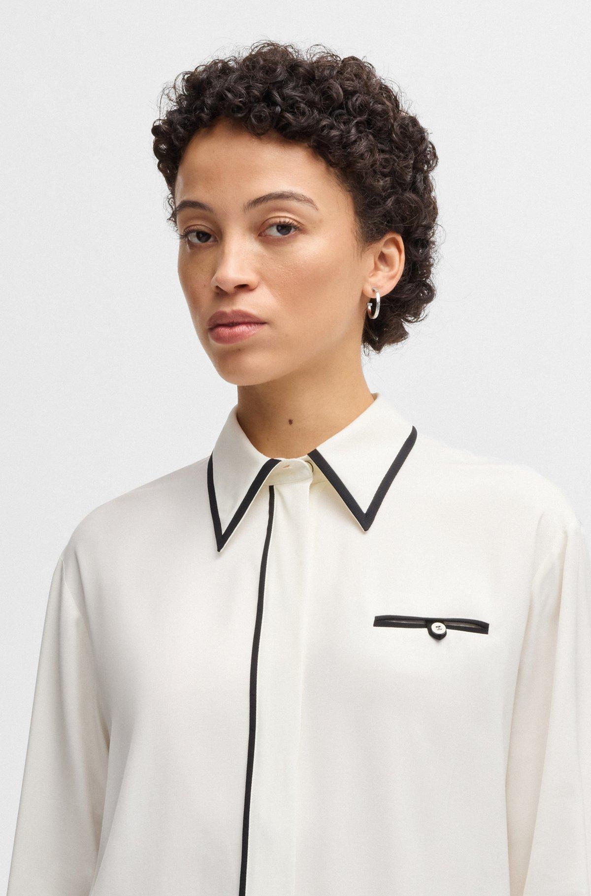 Loose-fit blouse with piped edges in soft twill Product Image