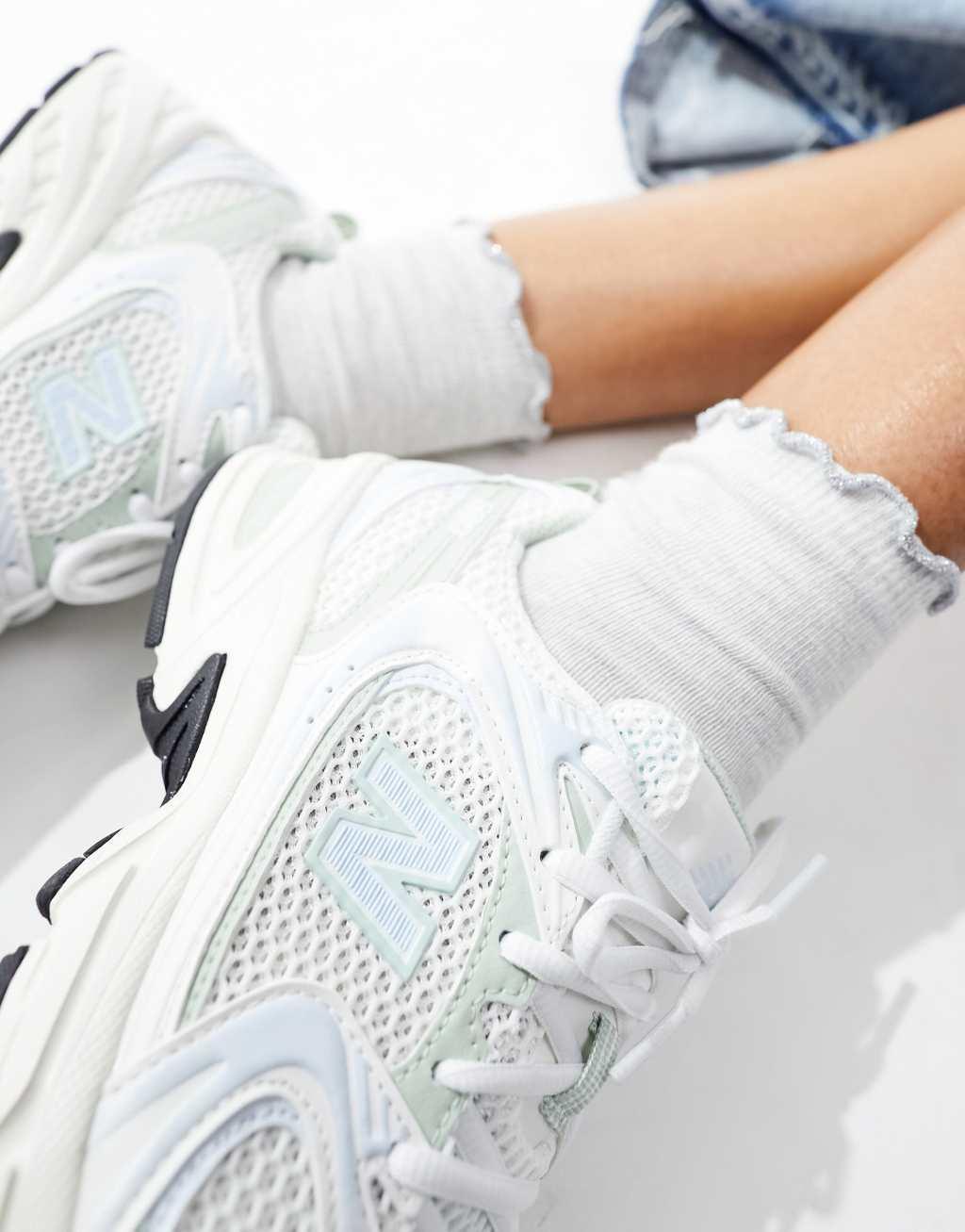 New Balance 530 sneakers in white with sage and light blue detail Product Image