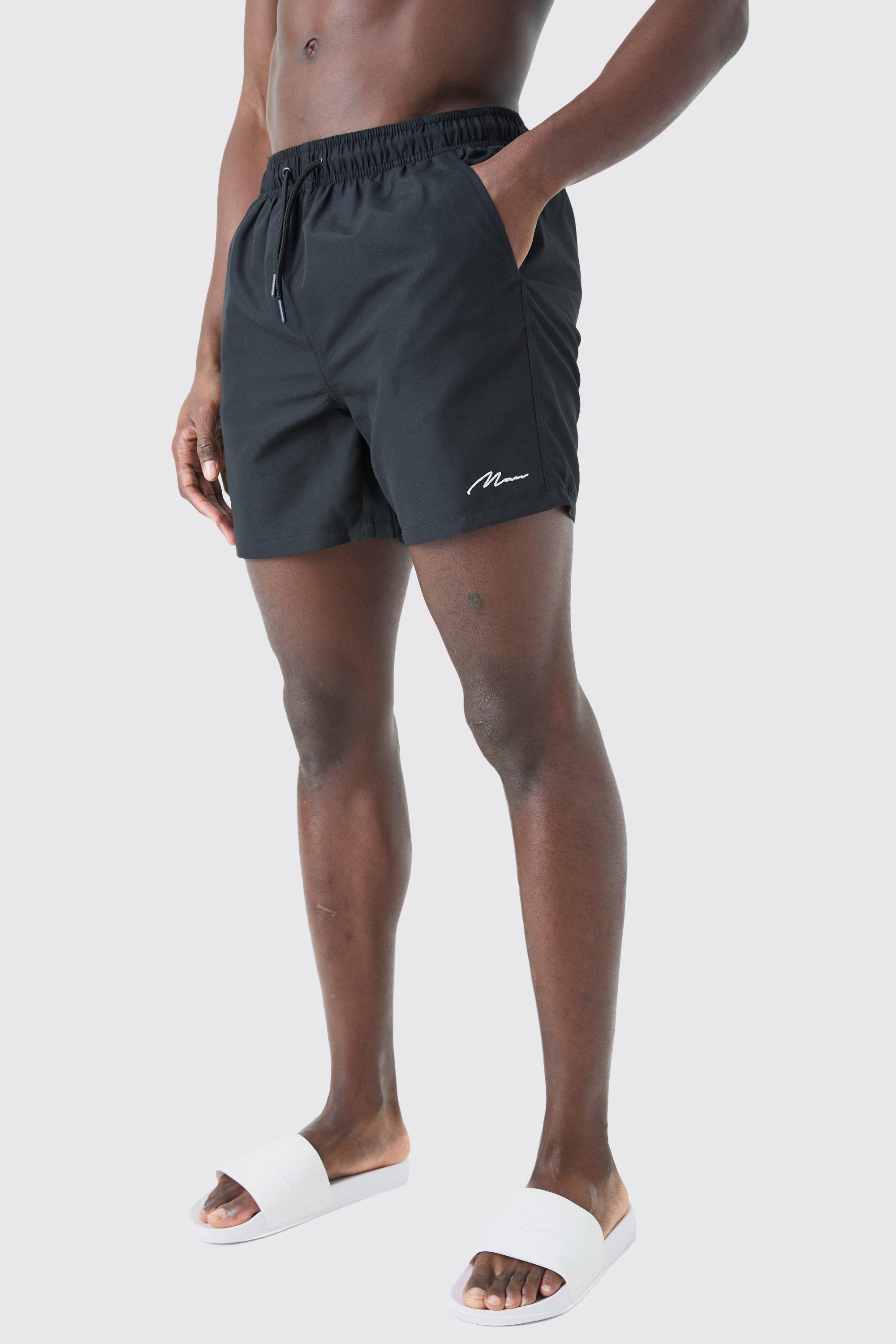 Man Signature Mid Length Swim Trunks | boohooMAN USA Product Image