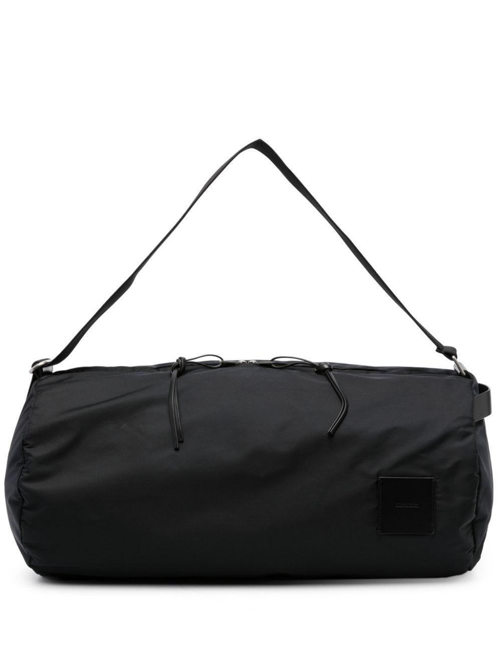 JIL SANDER Logo-patch Circular Duffle Bag In Black Product Image